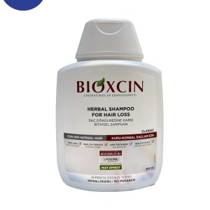 شامپو بيوكسين ضد ريزش گياهي مدل كلاسيك مناسب موهاي نرمال و خشك 300 میلBioxin anti-hair loss herbal shampoo, classic model, suitable for normal and dry hair, 300 ml
